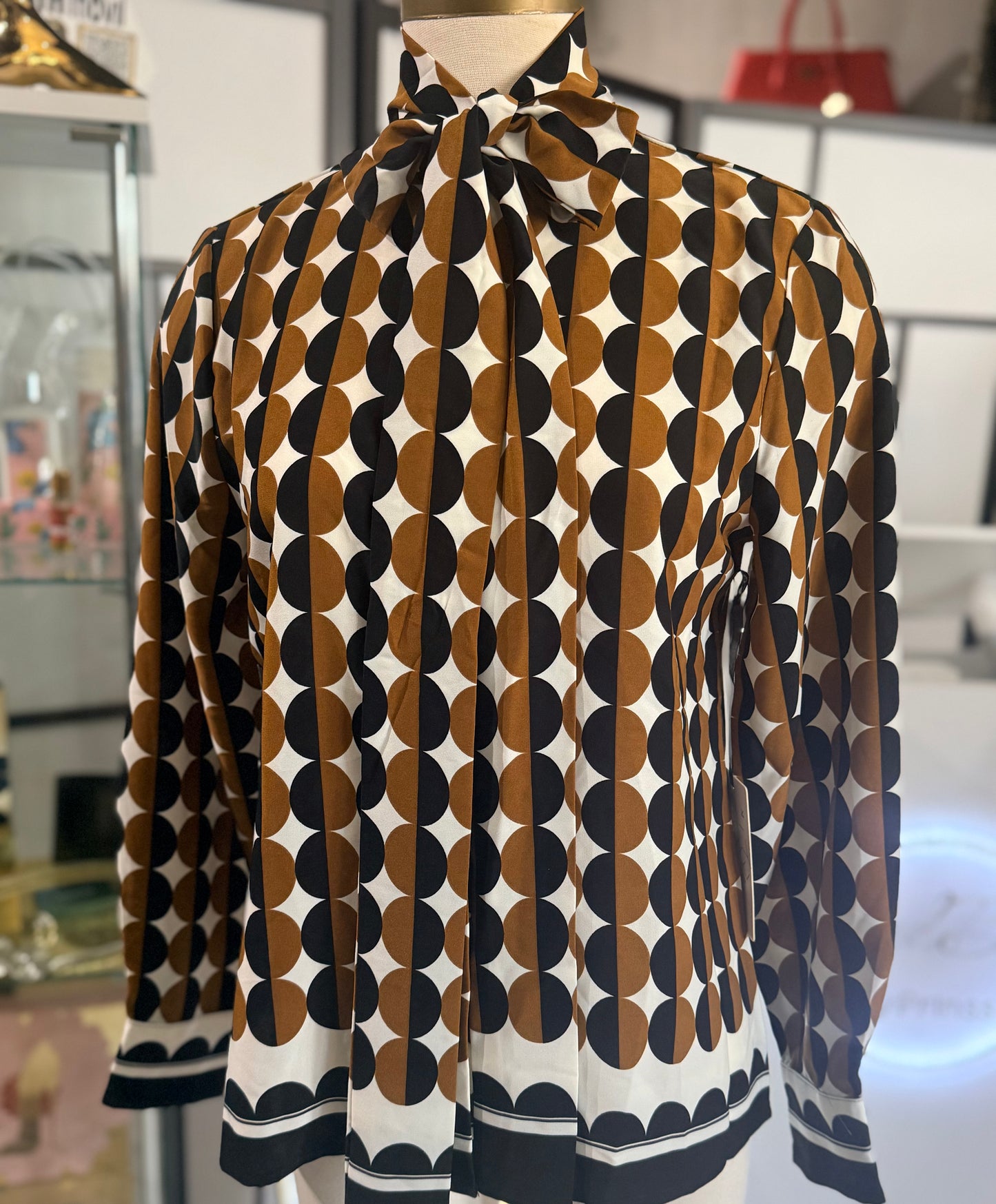 Blusa de bolas